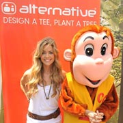 Denise Richards stands with a friend at Alternative's Green Forest booth.