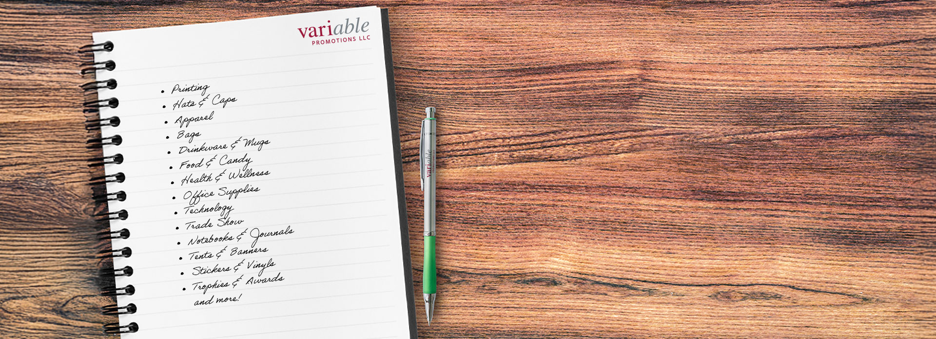notebook and pen on desk