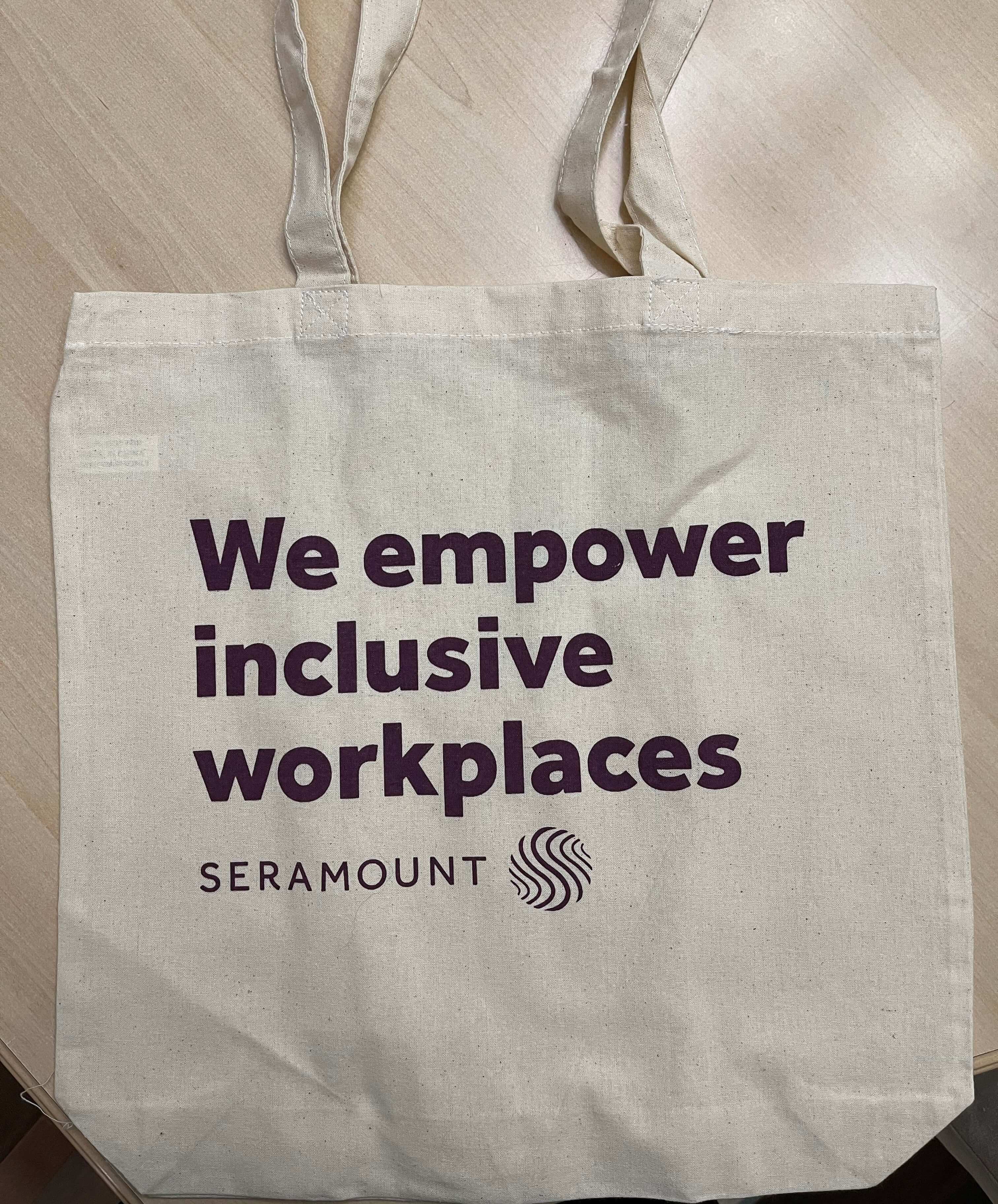 Dress up your presentation! This simple tote bag was mailed out to employees when Working Mother Media Group changed its name to Seramount.