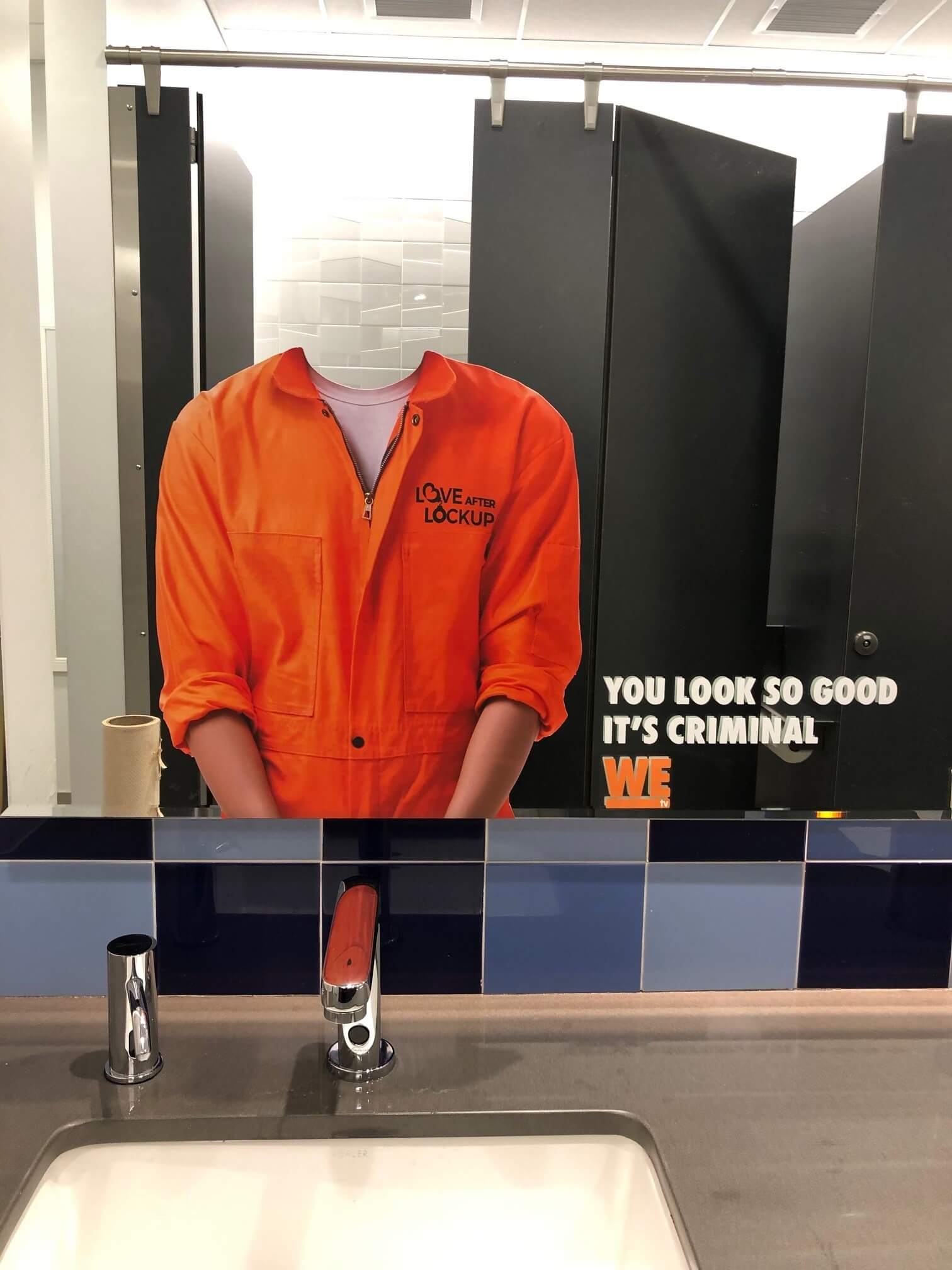 Creative Signage is important whether it’s in your office, restroom, outside, or in an elevator!  Talk about a captive audience....and who can’t resist a selfie with a jumpsuit. Sure does beat stripes!